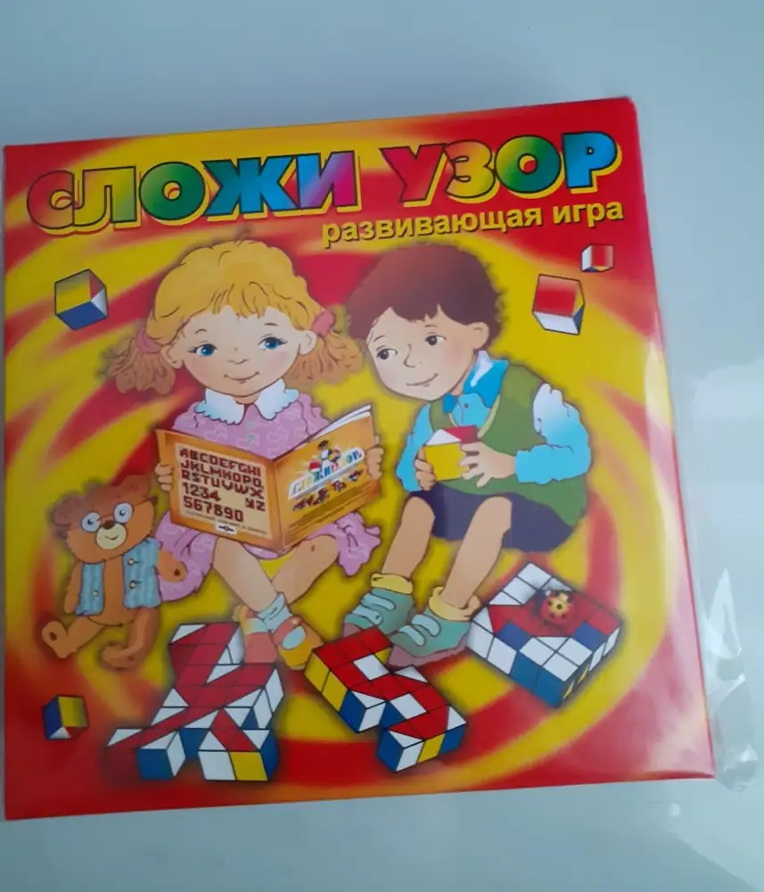 Отлично запаковано, все целое, в коробочке, брошюра на месте. Кубики аккуратно сделаны: пластиковые, синие, обклеены цветными наклейками.  Полезная, интерная, развивающая игра. Спасибо!